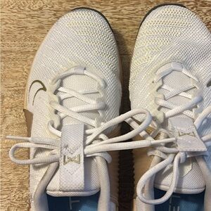 Nike White and Gold Athletic Shoes